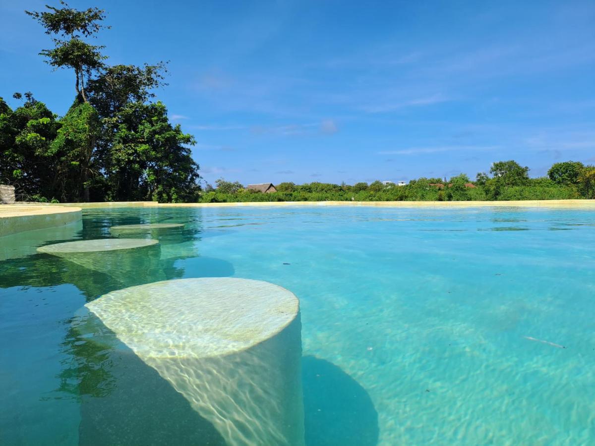 Cave Diani Holiday Apartments เดียนีบีช ภายนอก รูปภาพ